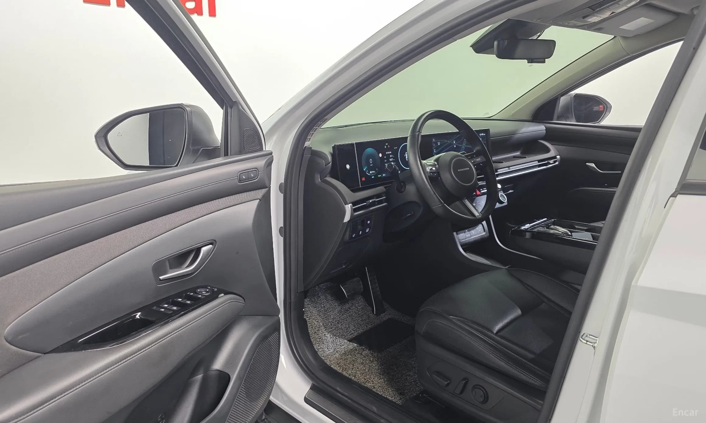 Tucson Hybrid (NX4)